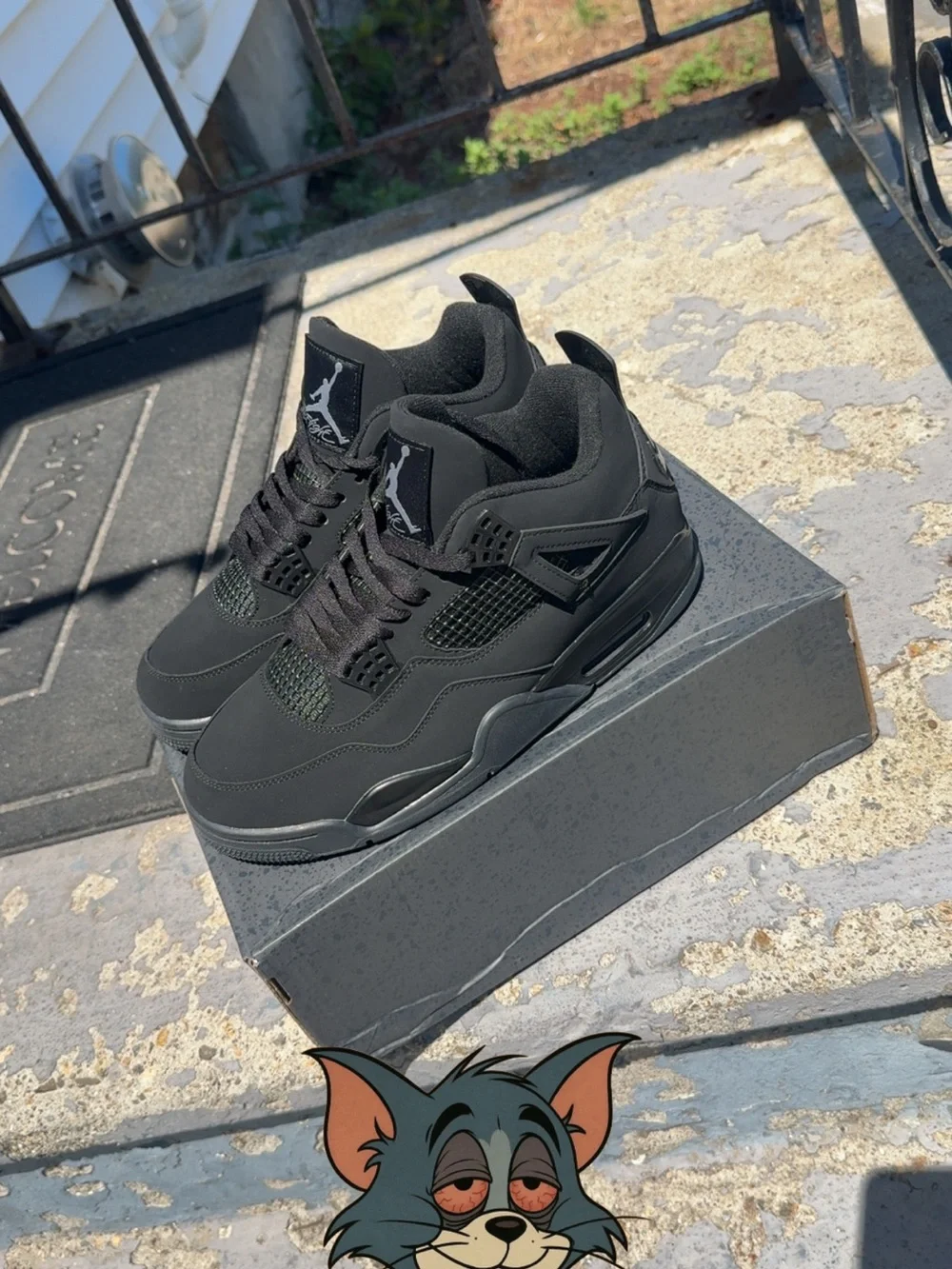 Jordan Men’s Black Retro 4 Sneakers